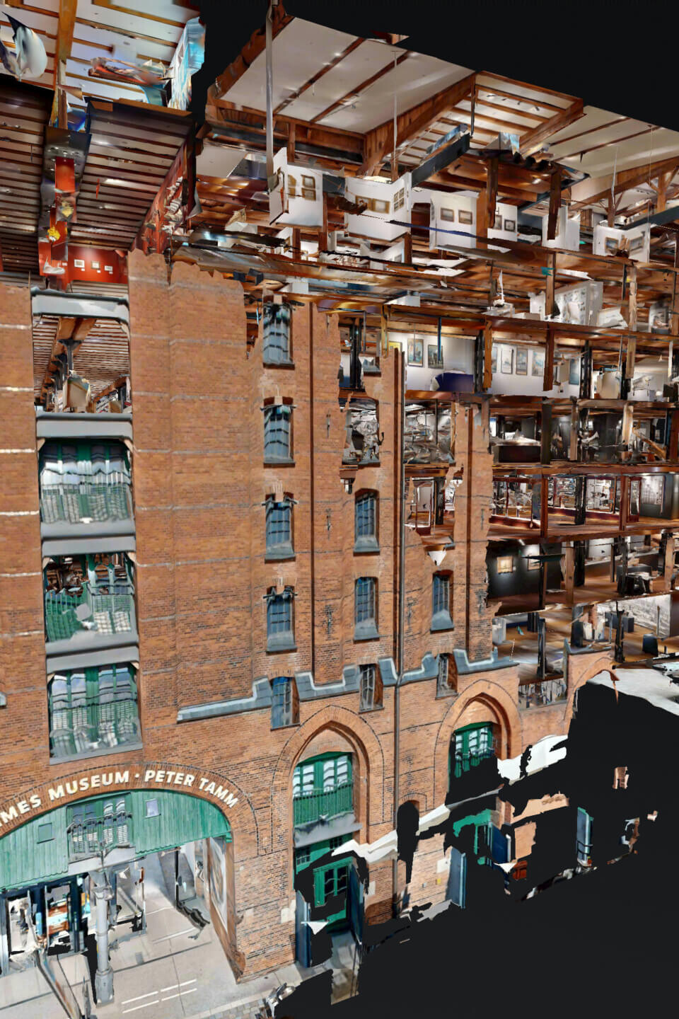 3D‑Schnitt eines roten Backsteingebäudes (Maritimes Museum Peter Tamm) auf schwarzem Hintergrund, freigelegte Etagen mit Holzdecken, Ausstellungsräumen und Vitrinen