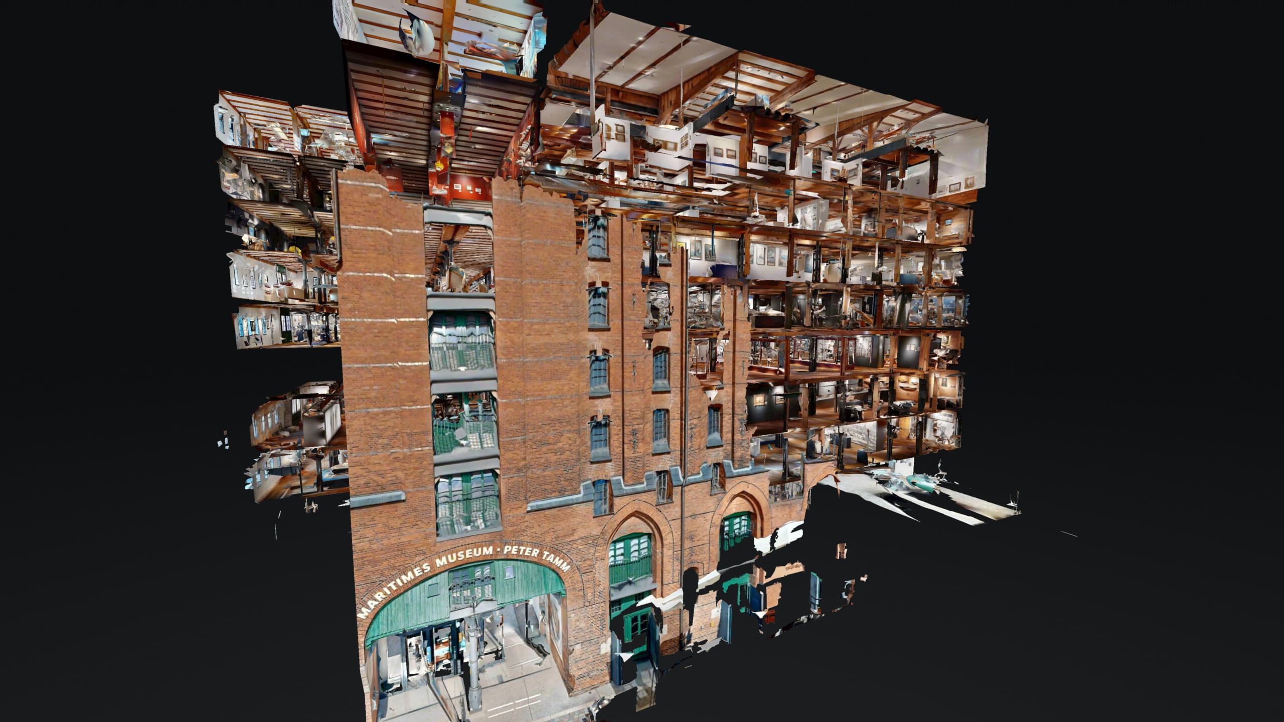 3D‑Schnitt eines roten Backsteingebäudes (Maritimes Museum Peter Tamm) auf schwarzem Hintergrund, freigelegte Etagen mit Holzdecken, Ausstellungsräumen und Vitrinen